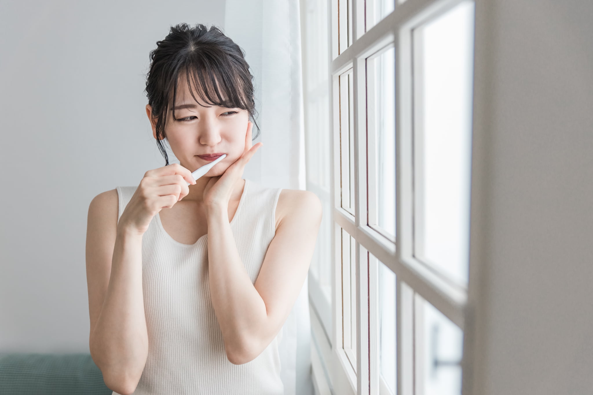 正しい歯みがきができておらず虫歯になってしまった女性