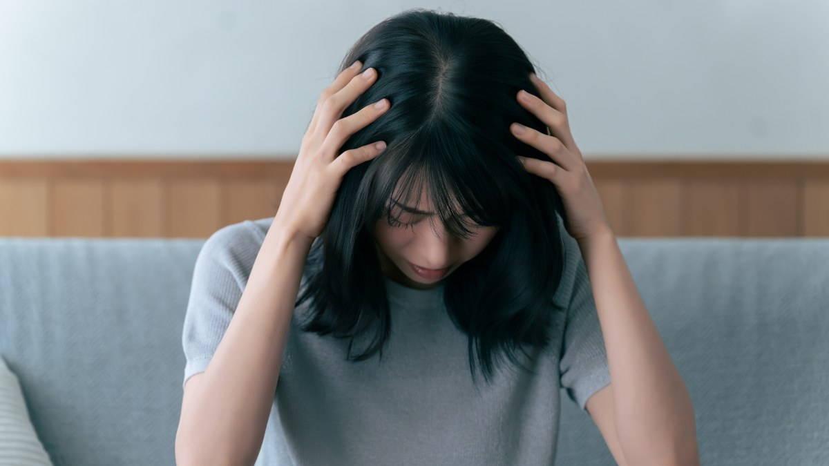 インプラント治療中に妊娠が発覚したらどうするか不安な女性